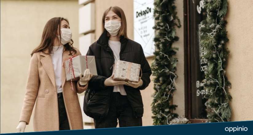 Appinio Corona Studie_zwei Frauen mit Maske mit Weihnachstgeschenken